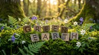 Wooden letter blocks spelling Green Earth on a mossy forest floor with ferns and wildflowers, sunlight filtering through trees in background.