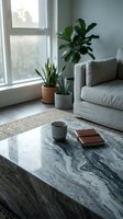 Modern living room interior with marble coffee table, houseplants and natural light creating cozy minimalist home atmosphere for lifestyle design.