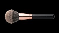 Fluffy powder makeup brush with rose gold ferrule and black handle, isolated on transparent background, ready for beauty, cosmetics, T-shirt, sticker, and print on demand designs.