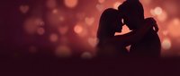 Romantic couple silhouette embracing against warm bokeh heart background for Valentine's Day, anniversary, love celebration and wedding designs.