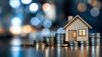 Small wooden house model surrounded by rising stacks of coins on reflective surface against blurred bokeh background, representing real estate investment and property finance.