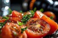Fresh sliced tomatoes with herbs and spices in cast iron skillet, perfect for cooking and culinary presentations.