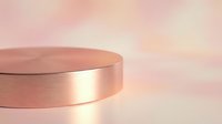 Elegant rose gold metallic cylinder podium on soft pink gradient background for luxury product display and cosmetic presentation.