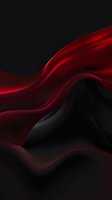 Abstract flowing red and black waves create dramatic contrast against dark background, featuring smooth curves and silky texture for luxury designs and presentations.