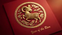 Golden ram zodiac medallion on red card with Year of the Ram text, celebrating Chinese New Year with ornate traditional design.
