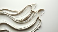Curving layers of white paper create abstract flowing waves against light background, showcasing elegant minimalist design and organic movement patterns.