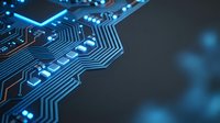 Close-up of illuminated blue circuit board with glowing electronic pathways and components for technology and innovation projects.