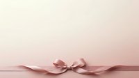 Satin ribbon bow in dusty rose tone tied on soft pink background, isolated design element for gift wrapping, invitations, and decorative projects.