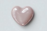 Pink ceramic heart shape isolated on white background for romantic decoration and love concept design projects.