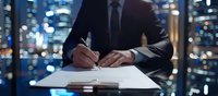 Businessman in dark suit signing contract at night office, panoramic windows with blurred city lights skyline background, corporate success concept.