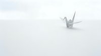 White origami paper crane on clean minimalist background symbolizing peace, hope and Japanese art tradition for meditation and wellness concepts.