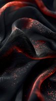 Abstract black waves with glowing red particles and light effects creating dynamic flowing curves and textures against dark background. Suitable for luxury designs.