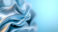 Elegant flowing silk fabric in light blue and white creates smooth waves and gentle folds against soft gradient background. Luxury textile macro photography.