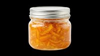 Jar of golden orange gummy candies with metal screw cap lid, isolated on transparent background. Ready for packaging design, product mockups, e-commerce, print-on-demand, and digital marketing materials.