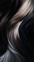 Flowing strands of silky hair in multiple tones from platinum blonde to deep black create smooth, wavy curves against dark background for beauty and fashion designs.