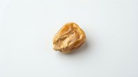 Single walnut half isolated on white background for healthy snacking and cooking ingredients in culinary designs.