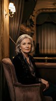 Elegant senior Caucasian businesswoman in luxury train car interior with vintage decor and warm lighting for corporate travel and lifestyle concepts.