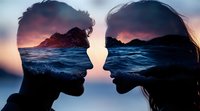 Double exposure silhouettes of man and woman profiles merged with ocean waves and mountain landscape against dramatic sunset sky. Romantic concept.