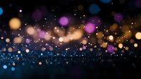Magical bokeh lights creating dreamy atmosphere with golden, purple and blue glowing particles floating in dark space, abstract blurred background.