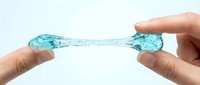 Transparent blue gel or slime stretching between two hands against white background, isolated for design use on merchandise and promotional materials.