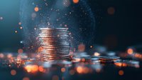 Stacked silver coins with glowing orange bokeh lights and particles on dark background, representing financial growth and investment success.