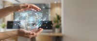 Two hands cupping glowing digital network sphere with interconnected nodes and data icons, representing technology, connectivity, and digital transformation in modern business environment.