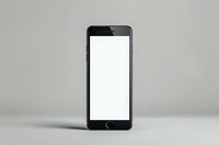 Modern smartphone with blank white screen on light gray background, isolated mockup for app and web design presentation, minimal tech composition.