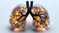 Glowing tree branches form lung shape with warm golden lights against dark background, creating ethereal anatomical art piece for medical or wellness design.