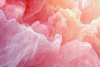 Ethereal pink and peach smoke clouds create dreamy abstract background with soft flowing movement and delicate translucent layers for creative design projects.