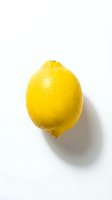 Fresh yellow lemon with textured skin isolated on white background, suitable for food, beverage, and culinary design projects.