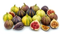 Fresh figs whole and sliced showing red interior flesh and seeds, isolated on white background for food, culinary, and recipe design use.