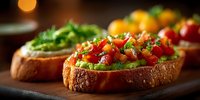 Fresh bruschetta topped with diced tomatoes, basil and herbs on toasted bread slices served on wooden board for appetizer menu and Italian cuisine.