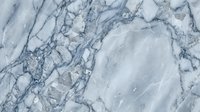Gray marble texture with intricate veining patterns and natural stone surface details for luxury interior design and architectural applications.