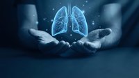 Glowing blue lungs floating above protective cupped hands against dark background. Medical healthcare concept for respiratory system protection and wellness.
