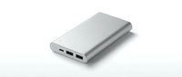Portable silver power bank with dual USB ports isolated on white background, ready for tech product design, web graphics, and marketing materials.