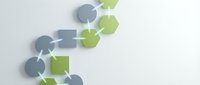 Abstract geometric composition with green and gray hexagonal and circular shapes on white background for modern design projects.