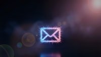 Glowing neon email envelope icon with bright light rays and lens flare effects on dark background for digital communication concepts.