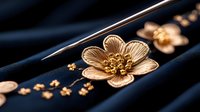 Elegant golden flower brooch with delicate petals and small decorative elements on dark blue velvet fabric, luxury jewelry accessory for fashion design.