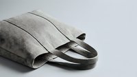 Linen tote bag with handles isolated on white background, ready for branding, mockup, and product design applications.