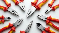 Professional electrician pliers set with insulated red and yellow handles arranged in circular pattern on white background for electrical work and repairs.