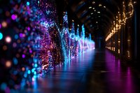 Magical illuminated tunnel with glowing blue and pink lights creating dreamy bokeh effect along dark corridor, reflecting on glossy floor. Perfect for festive designs.