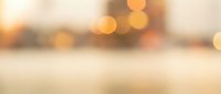 Warm golden bokeh lights creating soft blurred background with dreamy atmosphere for product photography and design projects.
