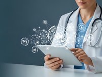 Female doctor using digital tablet with futuristic medical technology interface and network connections for healthcare innovation and telemedicine.