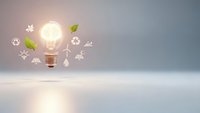 Glowing light bulb with green leaves and eco-friendly icons on clean gradient background representing sustainable energy innovation and environmental solutions.