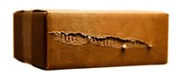 Cork block with torn paper texture revealing layers underneath, suitable for eco-friendly product design, sustainable packaging concepts, and natural material backgrounds.