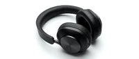 Modern black wireless headphones isolated on white background for audio technology and music listening applications.