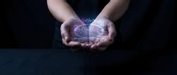 Hands holding glowing digital brain with neural network connections, representing artificial intelligence, technology innovation, and data processing concepts for business and science applications.