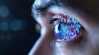 Futuristic close up of human eye with digital circuit pattern overlay and neon pink-blue glow, representing artificial intelligence and technological advancement in vision.