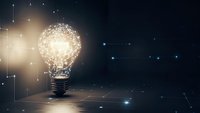 Glowing light bulb with network connections and particles on dark background representing innovation, creativity, and bright ideas for business solutions.