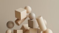 Stacked geometric wooden blocks and spheres in neutral tones arranged in abstract composition for minimalist design and branding projects.